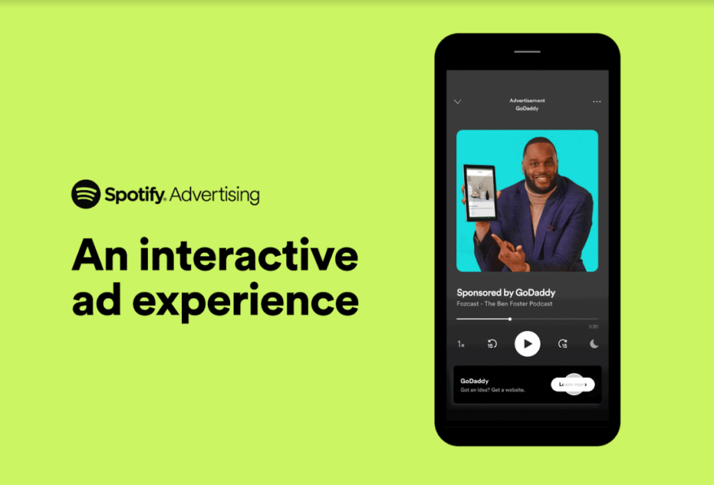 Publicité interactive Spotify sponsorisée par GoDaddy affichée sur un smartphone